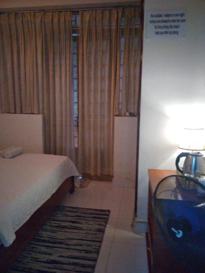 Guest House Uttrang Хошимин Экстерьер фото